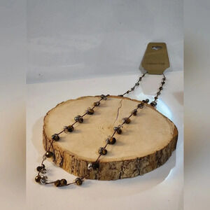 Coldwater Creek necklace with brown and silver beads strung on a brown cord NEW